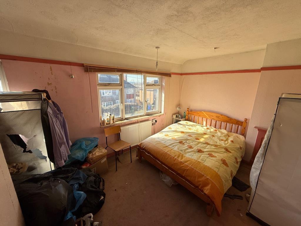 Lot: 47 - EXTENDED END-TERRACE HOUSE FOR IMPROVEMENT - Bedroom 1 with two windows to the front and views towards Dartford Crossing